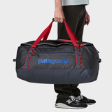 Black Hole Duffel 70L - Unisex - Smolder Blue w/Amanita Red - Gumpel & Co